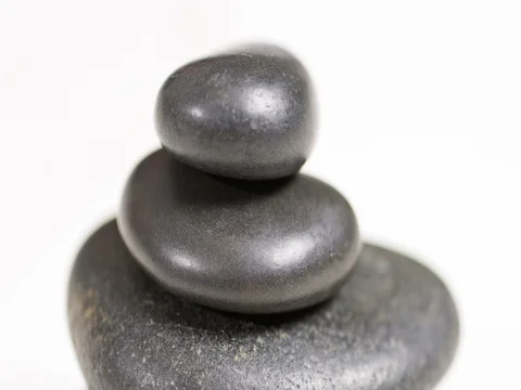 Panning over stacked spa rocks Stock Footage