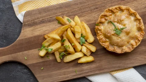 Panning over a Steak and Kidney Pie Stock Footage 239961599