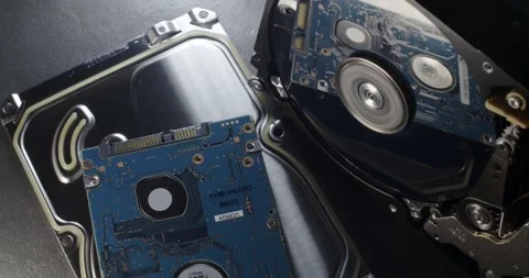 Panning over Storage device, reflection of circuit board on Hard Disk platter Stock Footage 132083201