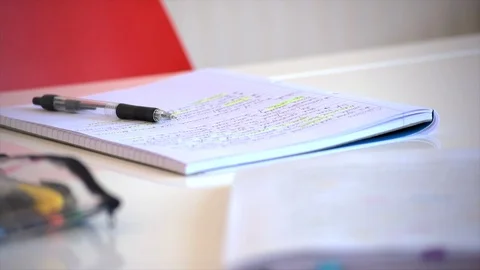 Panning Over Studnet's Desk Close Up Video stock 90167174