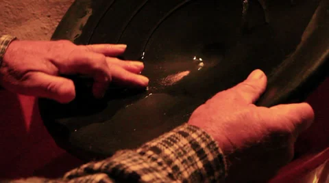 Panning pan for gold Stock Footage 32155458