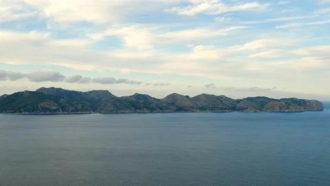 Panning panoramic view of mallorca coast with rocky cliffs and calm sea. rela Stock Footage 142988490