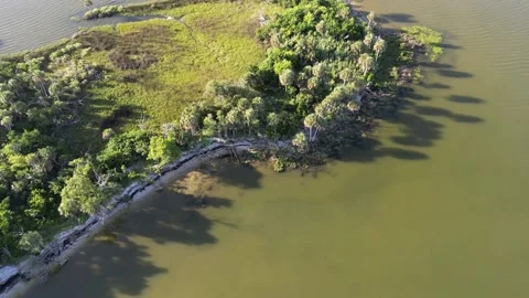 Panning a Peninsula from Left to Right, Sandy Beach and Water Video stock 203620923