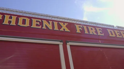 Panning phoenix fire dept sign on truck 스톡 동영상 330139906
