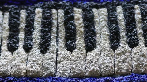 Panning of piano keys made of textile Stock Footage 337499618