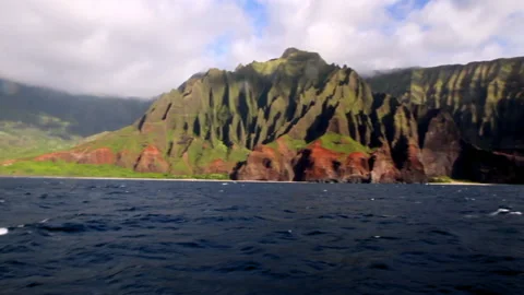 Panning Point Of View Shot Of Garden Isle Island By Wavy Ocean - Kauai, Hawaii Stock Footage 206325093