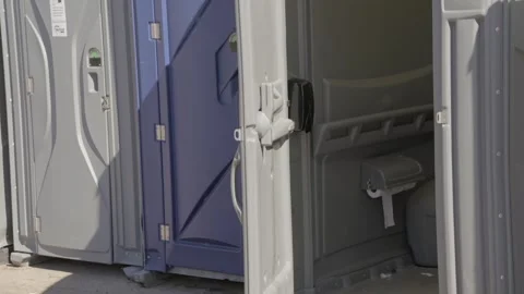 Panning porta potties Stock Footage 254518903