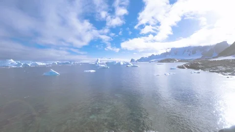 Panning of pristine Antarctic ocean bay in Antarctica on a sunny day Stock-Footage 122096547