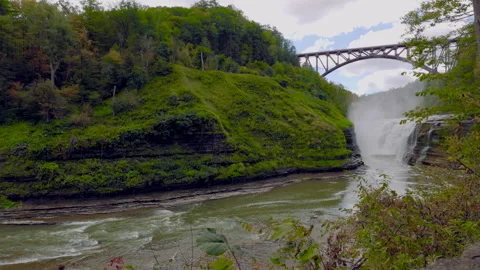 Panning Right to Bridge and Upper Falls at Letchworth State Park Slow Stock Footage 241046017