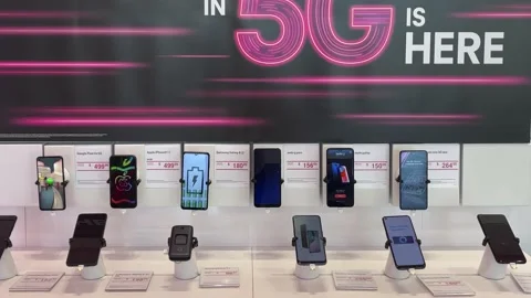 Panning right on a display of Google, Apple, Samsung, Moto, OnePlus, Alcatel, Stock Footage 163992449