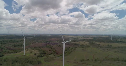 Panning right drone view of  Wind Turbines at wind farm, QLD, Australia Stock Footage 297596264