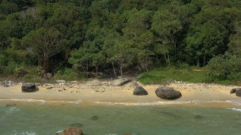Panning right in front of dirty polluted beach in Phu Quoc island Vietnam Asia c Stock Footage 124326791