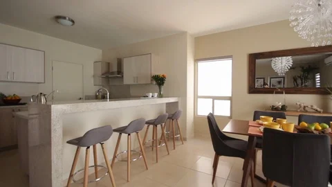 Panning from right to left of dining room Vídeos de archivo 115216890