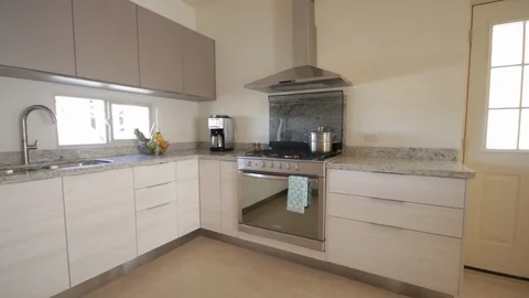 Panning from right to left of modern kitchen Stock-Footage 115215727