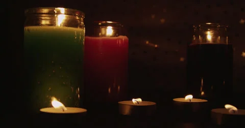 Panning Right of Lit Candles Stock Footage 37710845