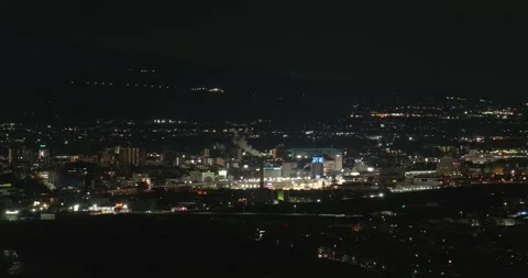 Panning right on the night view of Ueda city in Nagano, Japan Stock Footage 334680163