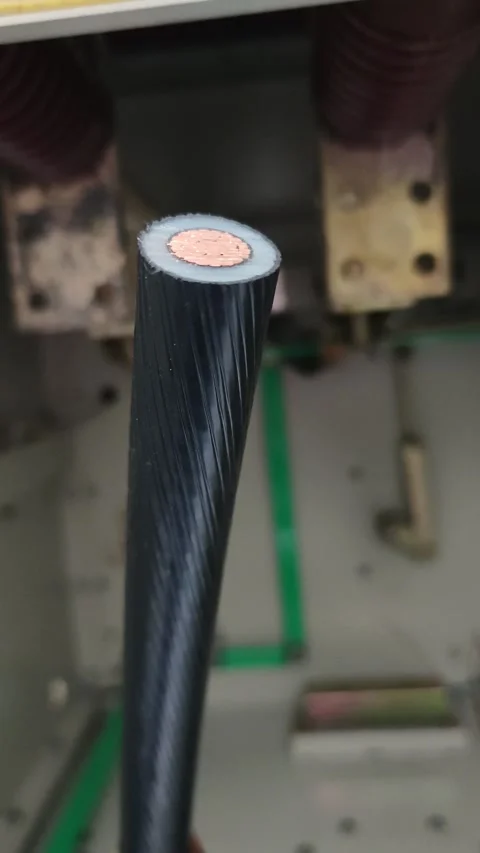 Panning right video of a cut underground electrical power cable. Stock Footage 338355449