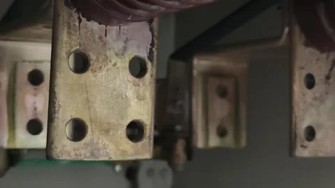 Panning right video of heavy copper terminals with drilled holes. Stock Footage 339022333