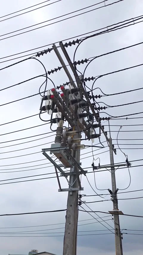 Panning right video of high voltage automatic circuit and disconnect switch. Stock Footage 339022405