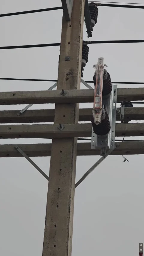 Panning right video of new high voltage disconnect switches wrapped. Stock Footage 339022372