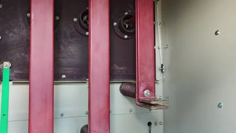 Panning right video of red insulated copper and insulators inside a medium. Stock Footage 339049368