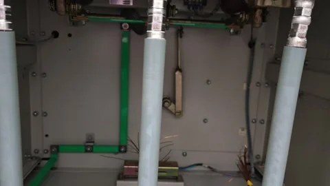 Panning right video of three phase underground electrical power cables. Stock Footage 338355329