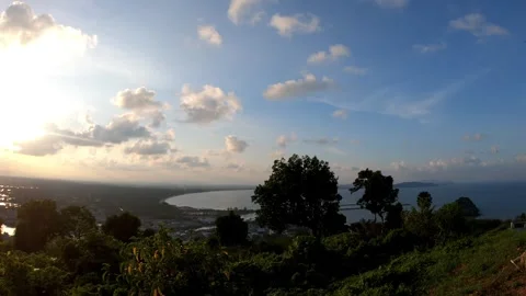 Panning right video view of dramatic sunbeams or god rays shining. Video stock 328819135