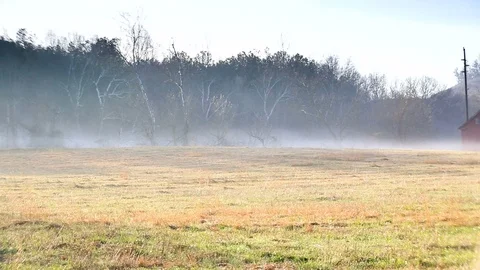 Panning right view of barn in field. Stock Footage 85957649