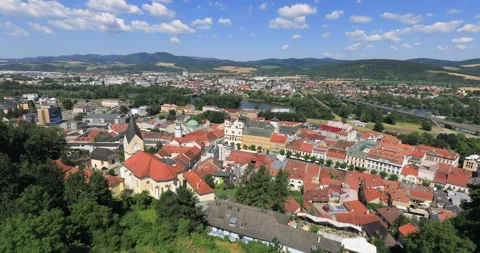 Panning right view of city skyline of Trencin and Peace Square, Trencin Stock Footage 338099291
