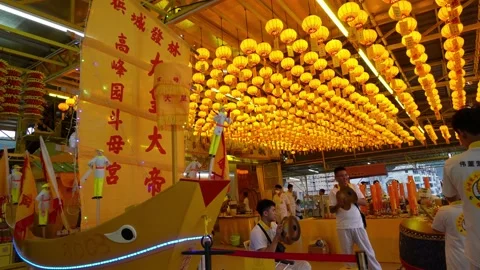 Panning right yellow boat model and lantern at Asia Heights Tou Mu Keong Temple Video stock 219800240