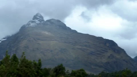 Panning seeing several snow-capped mountains in the Peruvian highlands of Huaras Stock Footage 164564102