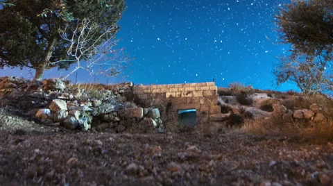 Panning shot of Astro time-lapse with olive trees in Bethlehem, Israel Stock Footage 54308651