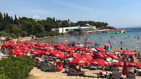 Panning shot of bacvice beach in Split, Dalmatia, Croatia Stock Footage 92867185