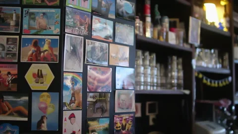 Panning Shot Bar Wall Decor To Bartender Pouring Beer In Paris Vídeos de archivo 344890195
