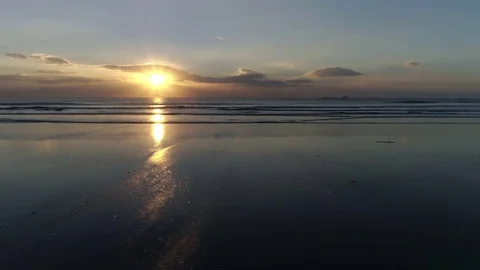 Panning Shot Of Beautiful Sunset Over Beach Stock Footage 79646109