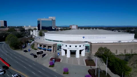Panning shot of the Bon Secours Wellness Arena in Greenville, SC ahead of Video stock 236876495