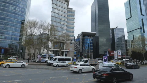 A panning shot of a busy road in the financial district of Istanbul. Stock Footage 306710341