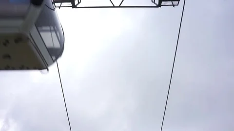 Panning shot of cable car overlooking mountains at Mount Dajti, Tirana, Albania Stock Footage 75999463