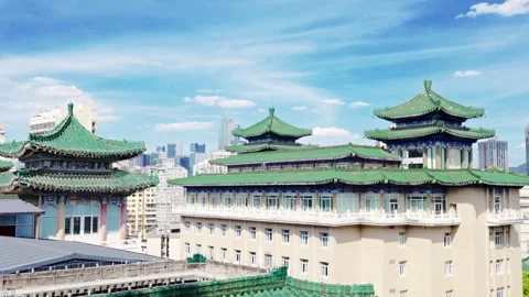 Panning shot of Chongqing People's Grand Hall side building Stock Footage 345417543