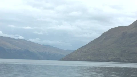Panning Shot of Cloudy Lake Stock Footage 64212237