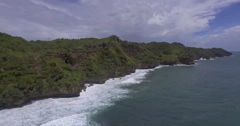 Panning shot of coastline in Java Stock Footage 71716152