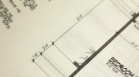 Panning shot of construction plans. Shallow depth of field. Stock Footage 306206