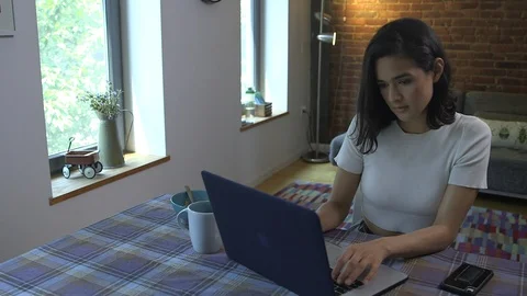 Panning shot of creative freelancer working on new business plan in home office Stock Footage 114854946