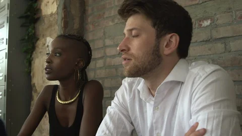 Panning shot of creative professionals planning new business in office Stock Footage 114855839