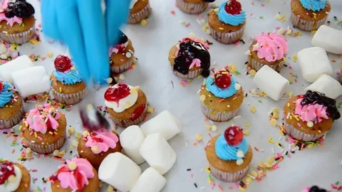 Panning shot of cupcake on table Stock Footage 94441139