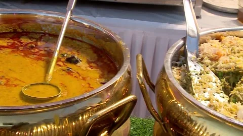 Panning Shot of Elegant Indian Wedding Buffet Setup Traditional Dishes Stock Footage 346388537