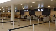 Panning Shot Of Empty Airport Check-In During Coronavirus Outbreak. Stock Footage
