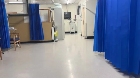 Panning shot of empty cubicles in hospital ward. Stock-Footage 334389718