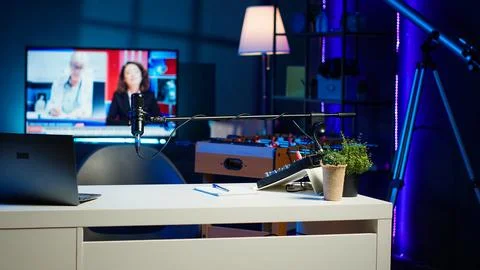Panning shot of empty home studio illuminated with neon lights 스톡 사진