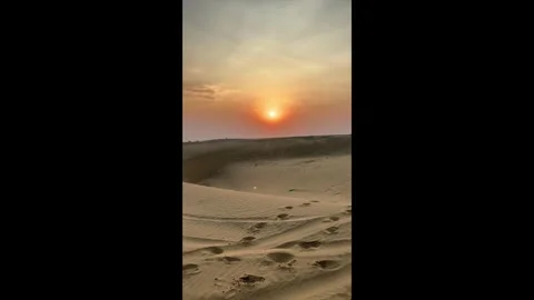 Panning shot of empty Indian desert at sunset in Jaisalmer, India Stock Footage 293305638